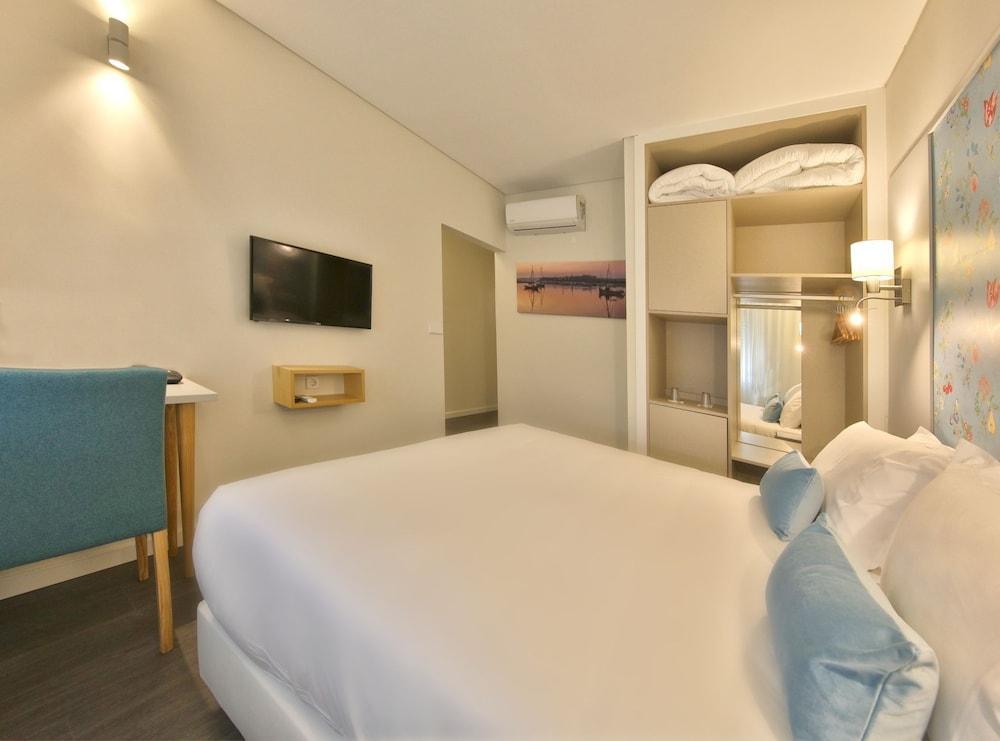 Agua Hotels Alvor Jardim Esterno foto