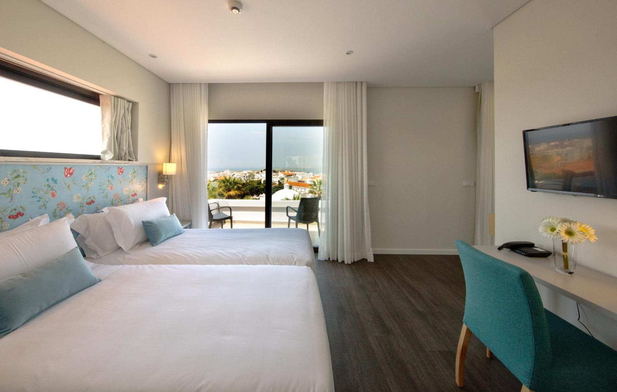 Agua Hotels Alvor Jardim Esterno foto